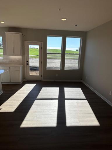 The cafe' has a patio door that will lead to a concrete patio in a similar Duncan end home