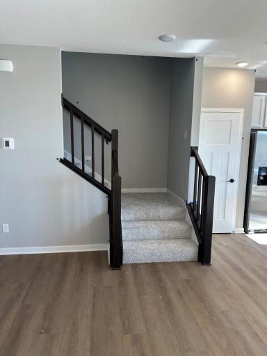 Beautiful railing leading to the second level in a similar Duncan end home