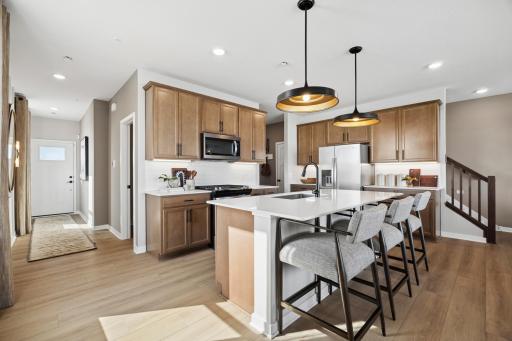 A large kitchen with ample cabinet space.