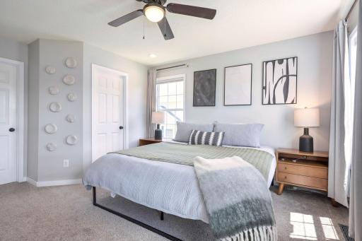 Primary bedroom with walk-in closet and walk-thru to main bath
