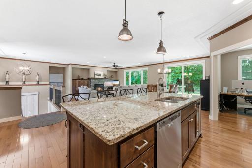 The kitchen is a bright and inviting centerpiece for everyday living and entertaining! With a backdrop of beautiful views year round!