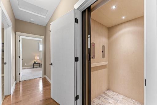 A private elevator from the garage to the main level provides the convenience of true main-level living!