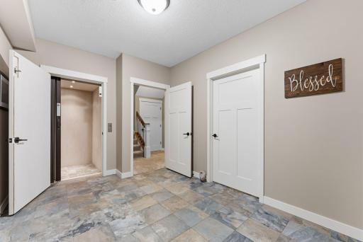 From the oversized garage entry, enjoy effortless access to all levels via the private elevator.