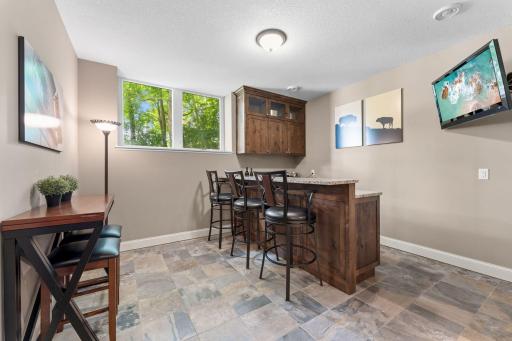 Wet bar with TV and full size refridgerator