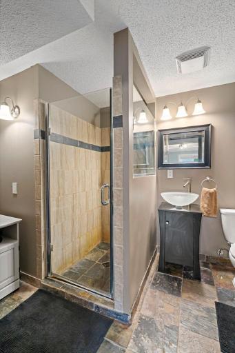 Lower level bathroom with shower.