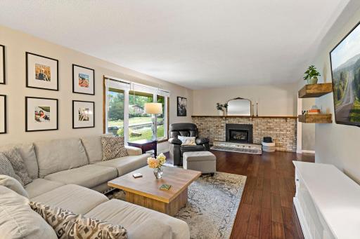 Living room is off kitchen and dining room.
