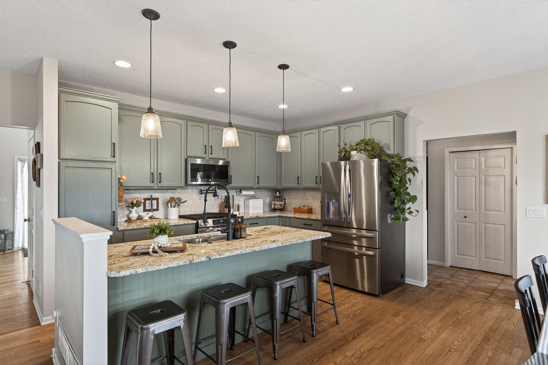 Great Kitchen Space Overlooks the Backyard
