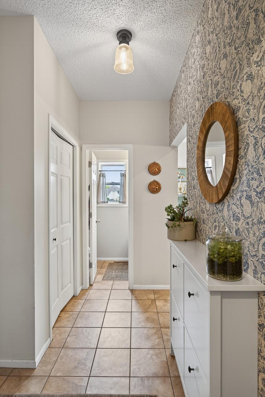 Mudroom with 1/2 Bathroom and Laundry Access