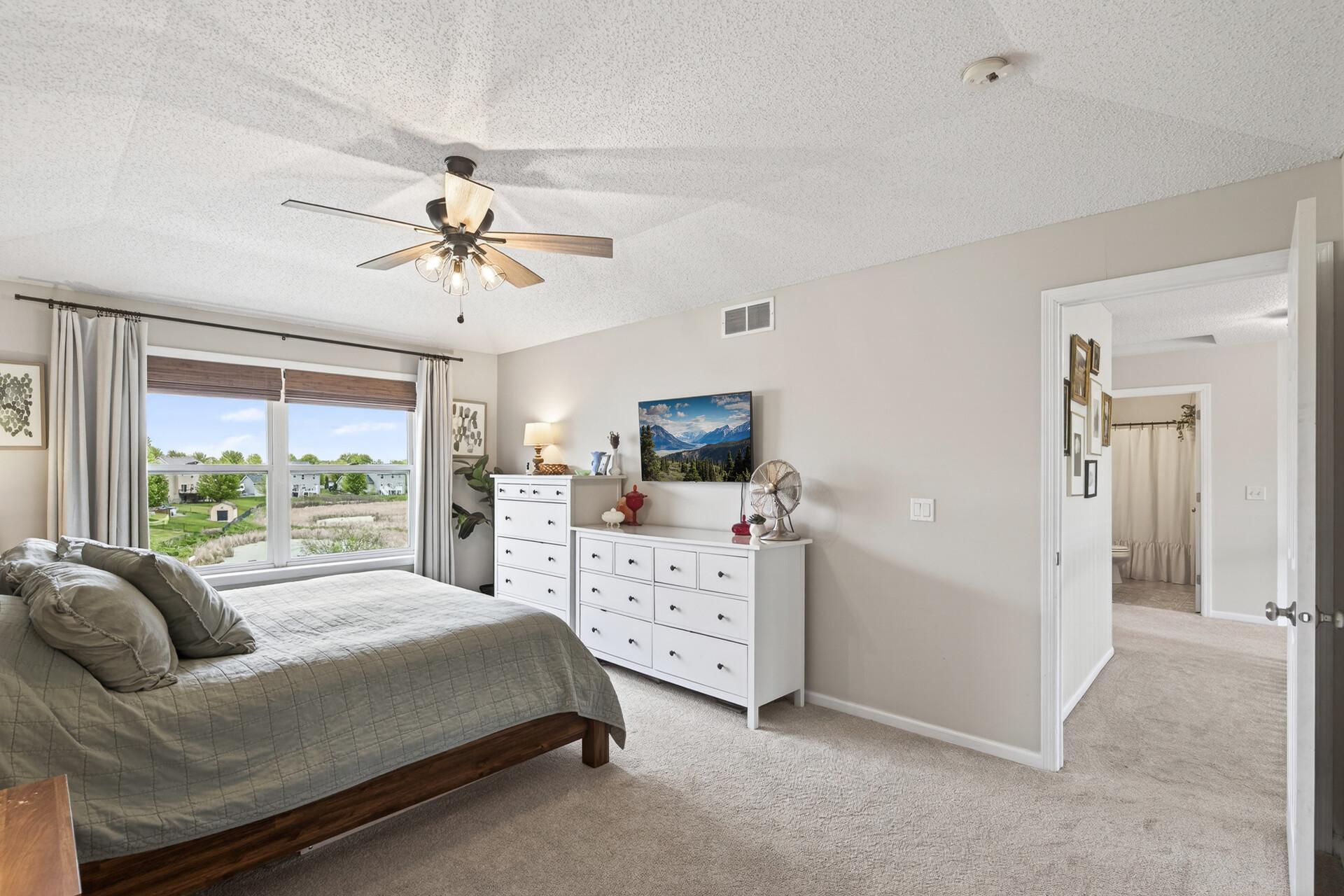 Primary Bedroom Suite Sits at the End of the Hallway