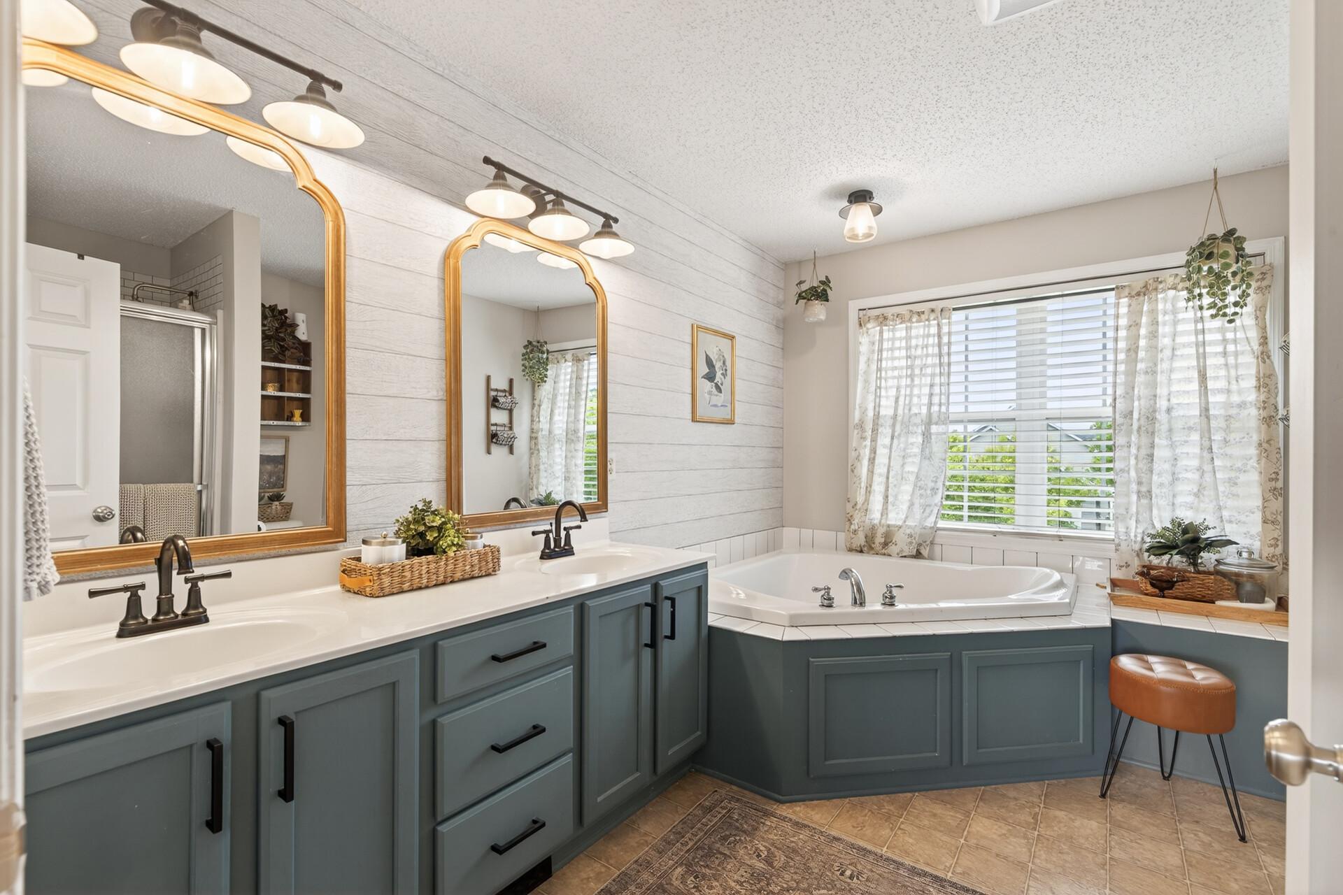 Primary Bathroom with Large Corner Spa Tub