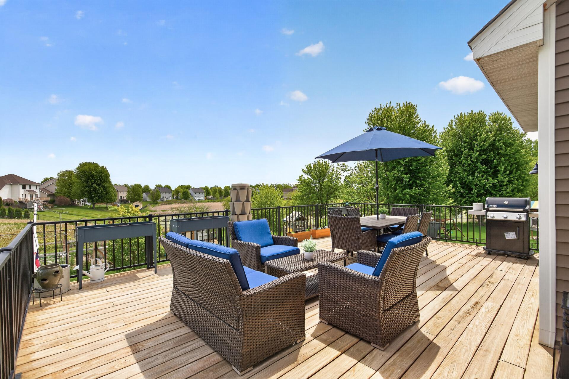 Huge Deck Overlooks the Backyard