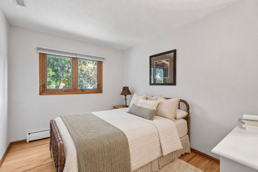 Bedroom 2: virtually staged to showcase decor