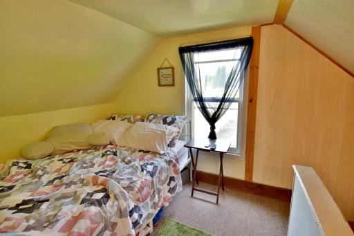 This space is at the top of the steps and could be a play area, reading nook or home office