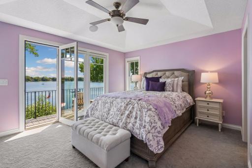 Master suite with balcony viewing the lake!