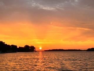 Enjoy the spectacular rising sun from your deck, and main level kitchen/dining/family room!