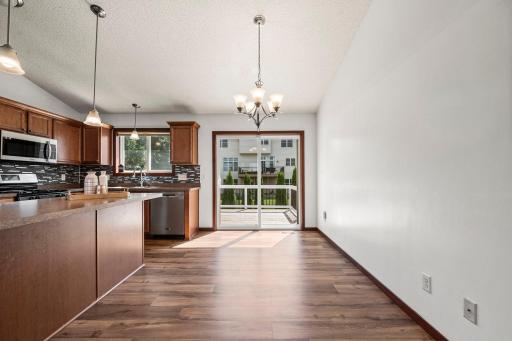 The sliding glass doors give easy access to the deck for outdoor summer grilling and entertaining.