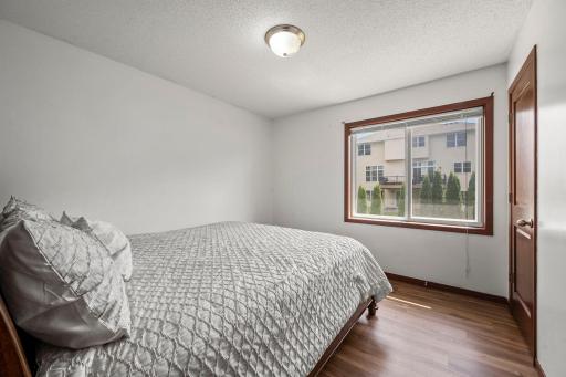 The second of three bedrooms on the main level.
