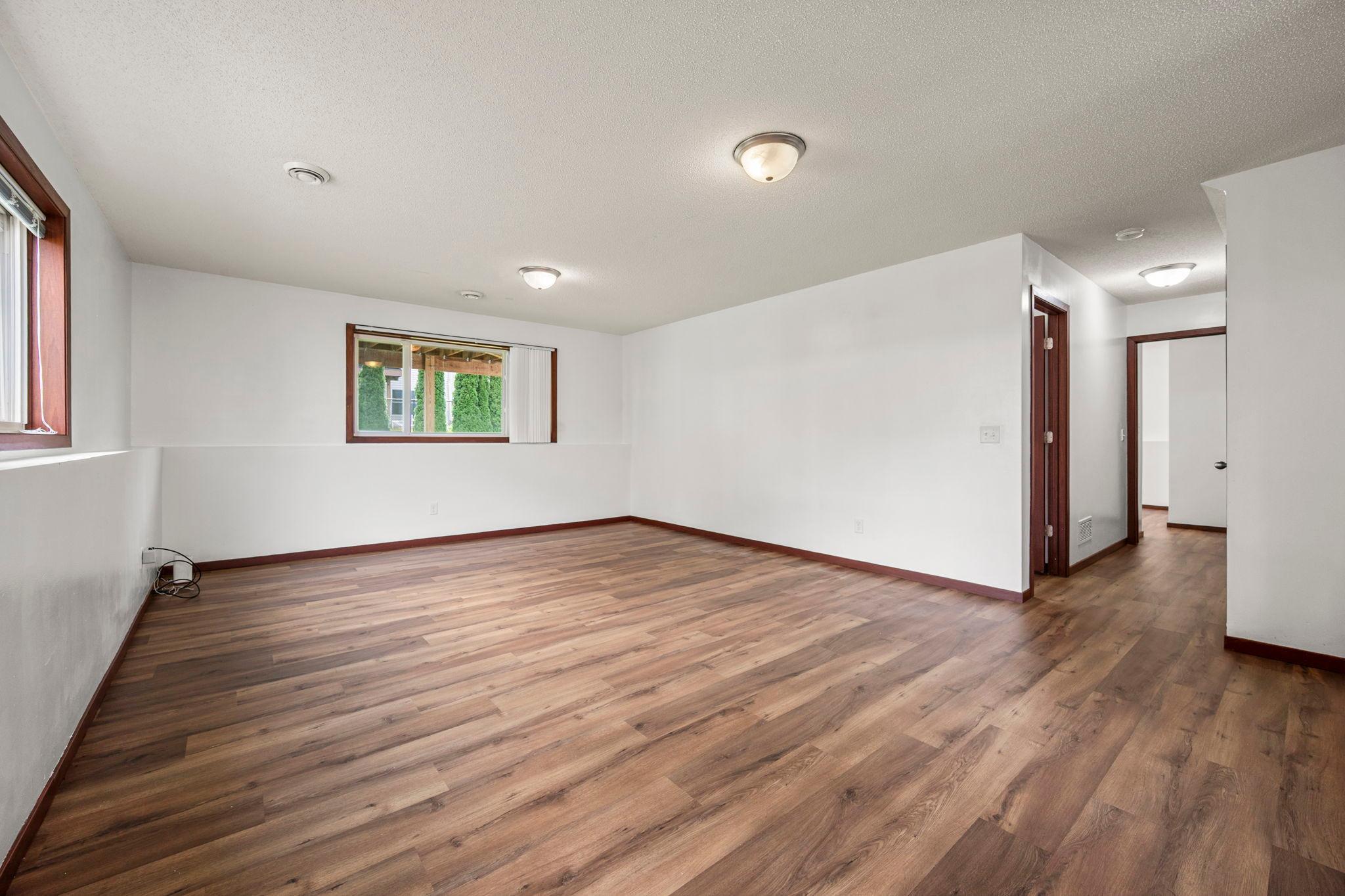 The large lower level family room is the perfect place to gather to watch television or entertain family and friends.