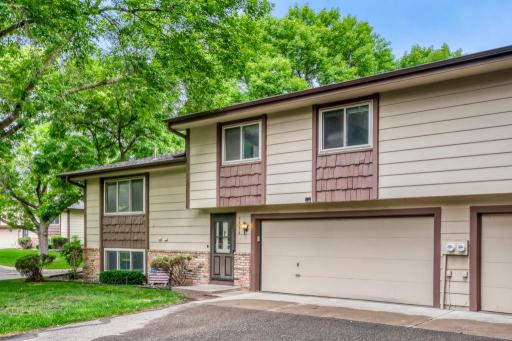 Photo for 5536 Aldrich Drive N, Brooklyn Center, MN 55430 - listing #7123434 Tuck under garage that fits a large vehicle. Side mounted garage door opener allows for parking of taller vehicles.