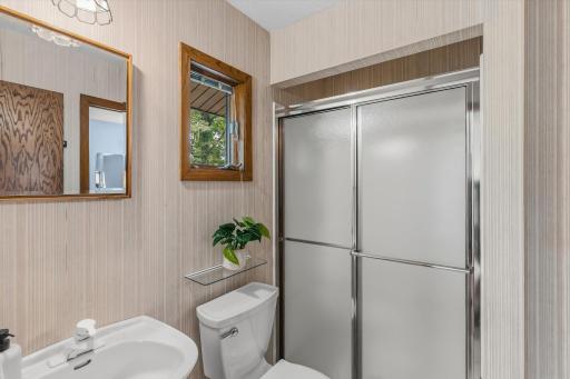 Primary 3/4 bathroom with a spacious shower.