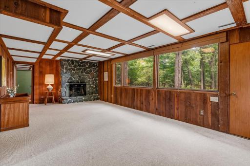 The lower level family has an additional fireplace.