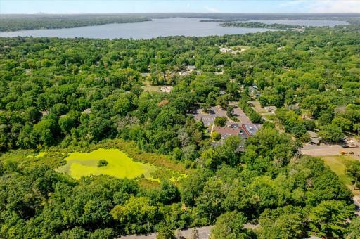 The pond is located at the back of the property. See how close you are to White Bear Lake and Mahtomedi Beach.