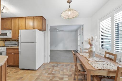 French doors lead from kitchen into second bedroom.