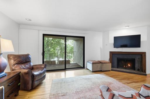 Wood burning fireplace and spacious covered deck/patio.
