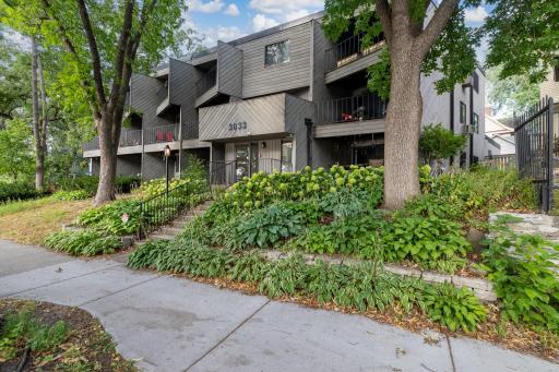 Enjoy this top floor condo and live amongst the trees!