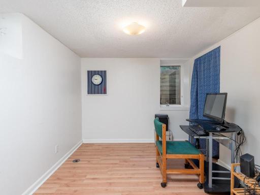Lower-level bedroom/office/workout with egress window!