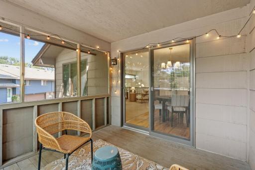 To complete the upper level, check out this fully screened, three-season porch.