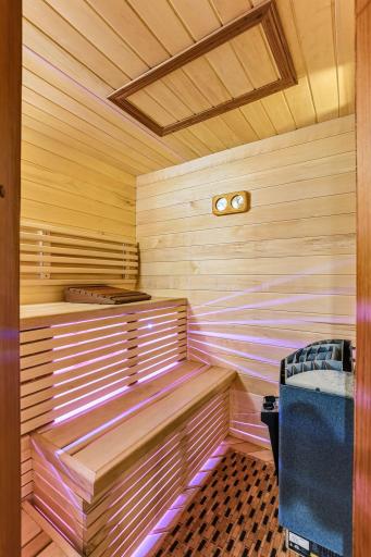 Custom built sauna with grade -A aspen walls inside and out.