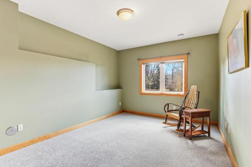 One of three spacious lower-level bedrooms.
