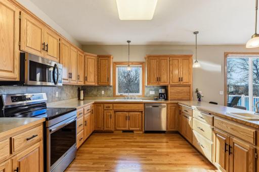 An impressive amount of custom-built oak cabinetry elevating the space with warmth and refinement.
