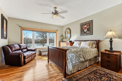 Luxurious owner’s suite enhanced by sweeping lake views.