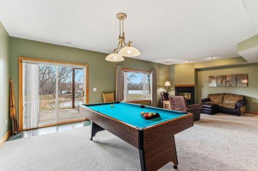 Walk-out lower level opens to a patio with stunning lake views—seamlessly blending indoor comfort with outdoor relaxation.