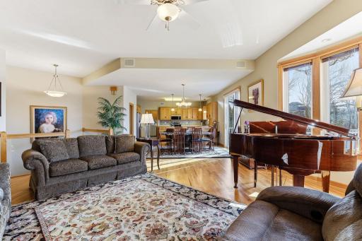 Gracefully connected living, dining, and kitchen spaces creating a refined open-concept flow.