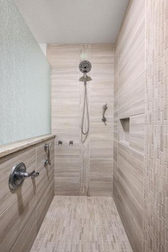 34-web-or-mls-12554-thrush-st-nw master shower.jpg