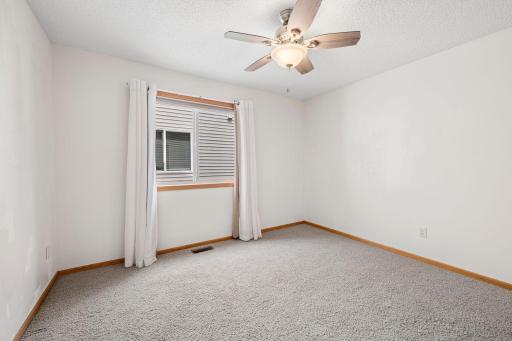 Good sized second bedroom with ceiling fan