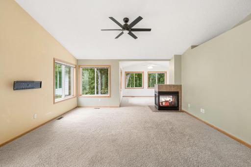 Large living room area with ceiling fan