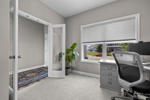 Mainfloor office with double glass french doors
