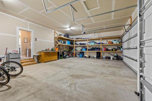 3 car garage with custom shelving