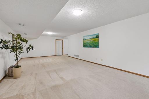 Family room leading to spacious storage with room for a workshop too