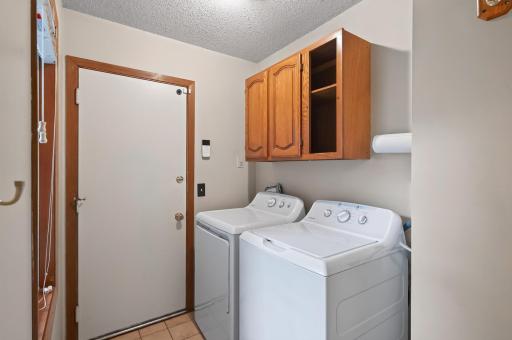 Laundry is in hall next to the interior garage door