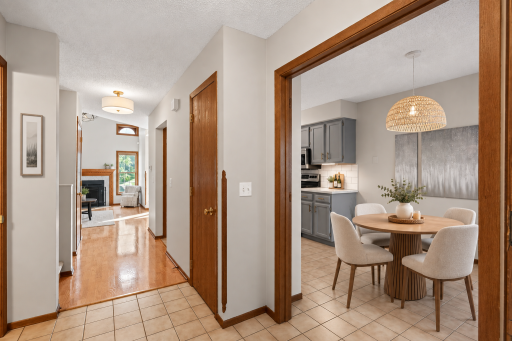 Entry looking into living room and kitchen (dining set virtually staged)