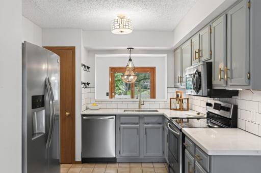 Beautiful countertops, stainless steel appliances, updated hardware & fixtures