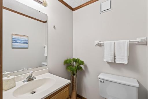 The 1/2 bath just inside the front entry door