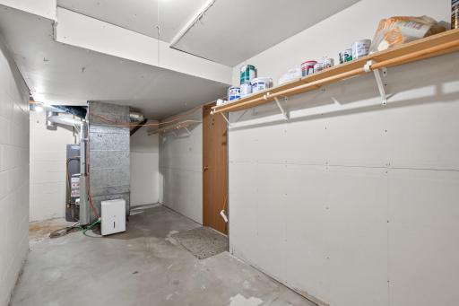 Utility/storage room with extra hanging space