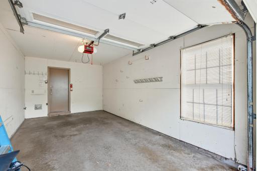 Single car garage with natural light from the window