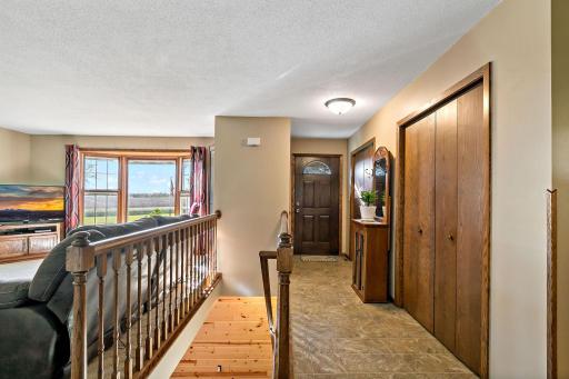 Nice entryway with one of the many closets throughout this spacious home.